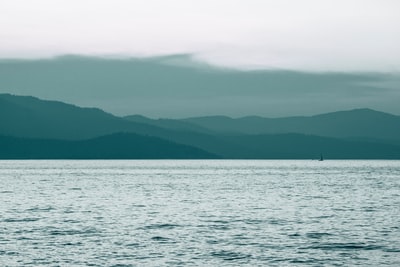 Bodies of water and mountains during the day
